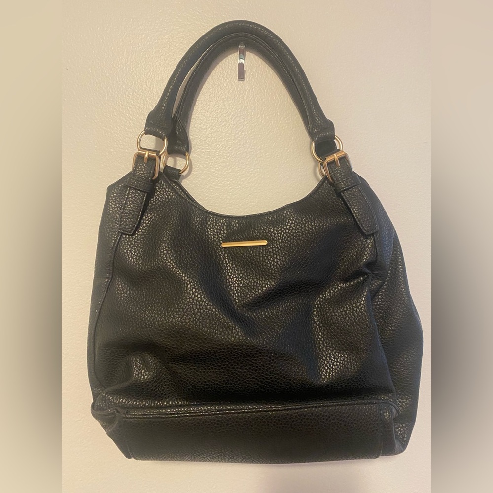 New/never used black pebble-patterned Atmosphere shoulder bag with gold hardware